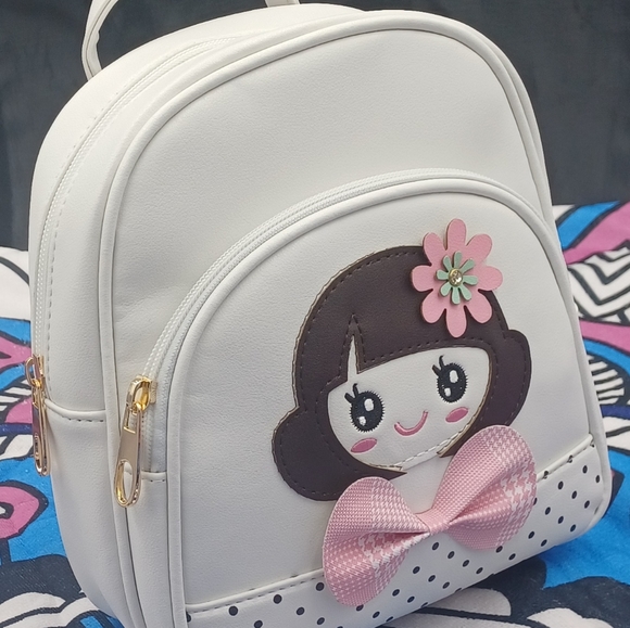 White Mini Backpack For girl wearing Pink Bow and Flower - Picture 4 of 8